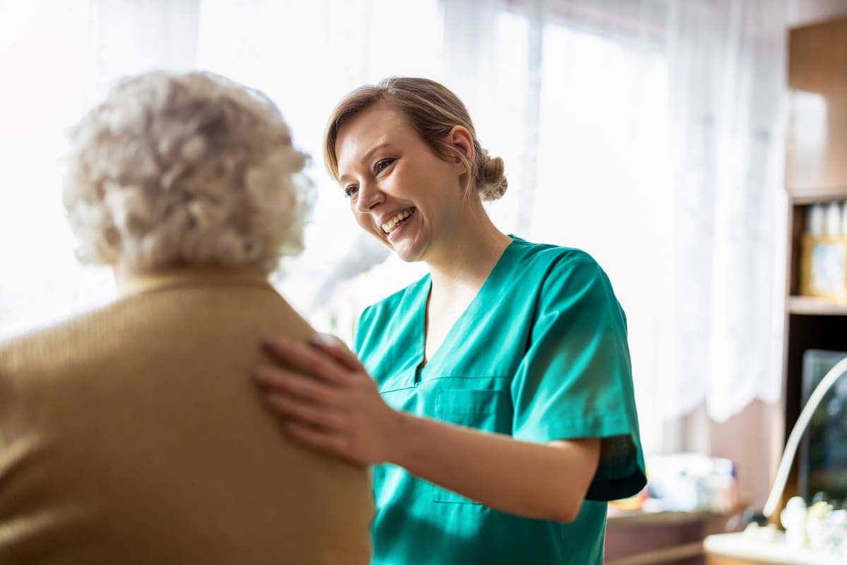 Doctor next to elderly lady